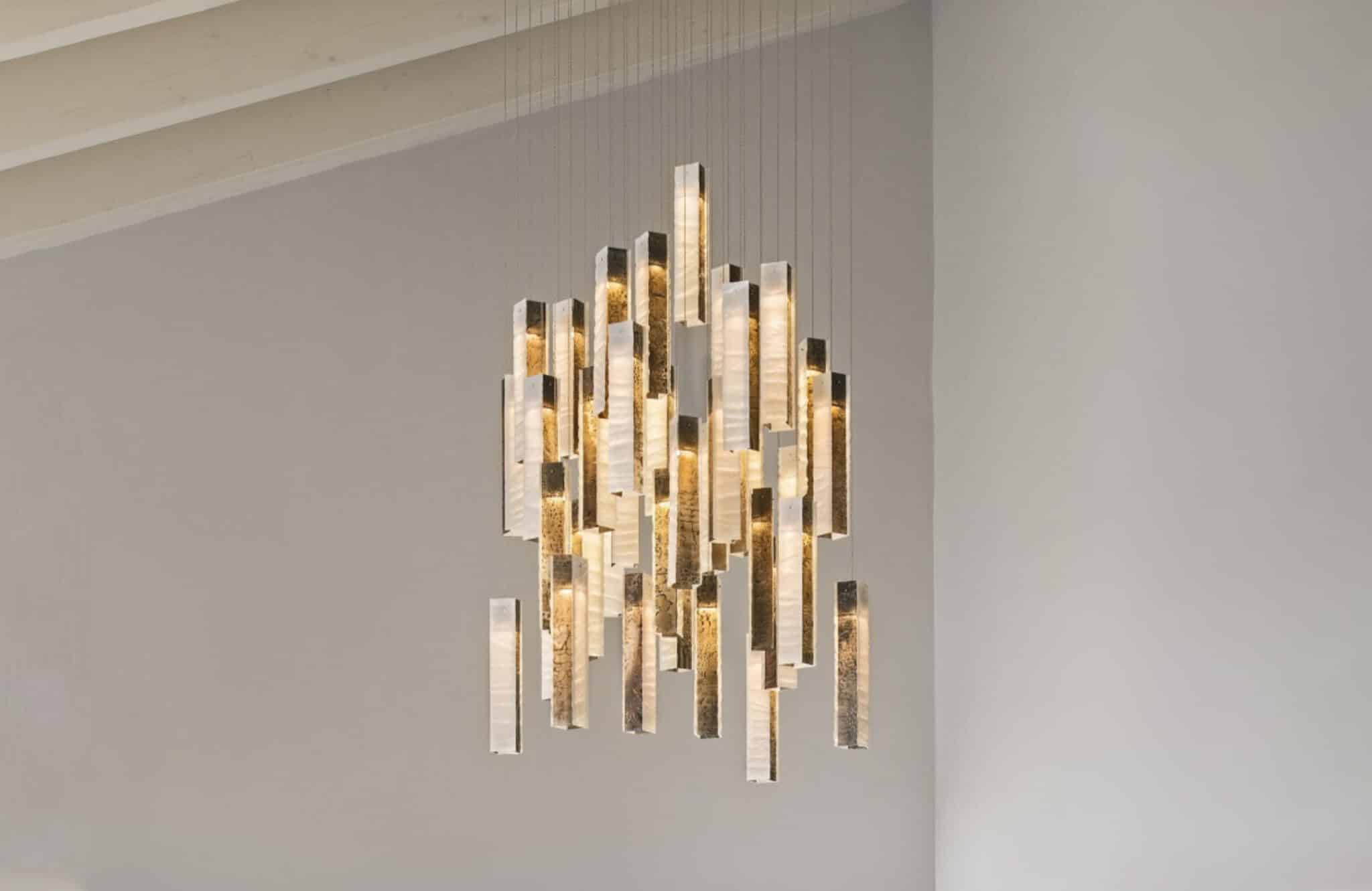 Earthy-toned cascading glass chandelier for rustic dining interiors