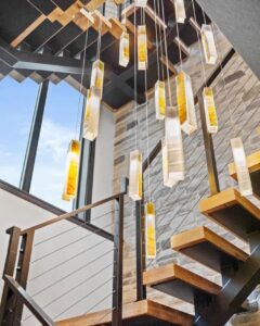 Vibrant art glass pendant chandelier in organic cascading composition