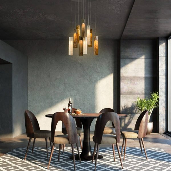 Artistic SunBeam Murano glass pendant lights above marble dining set with warm earthy hues