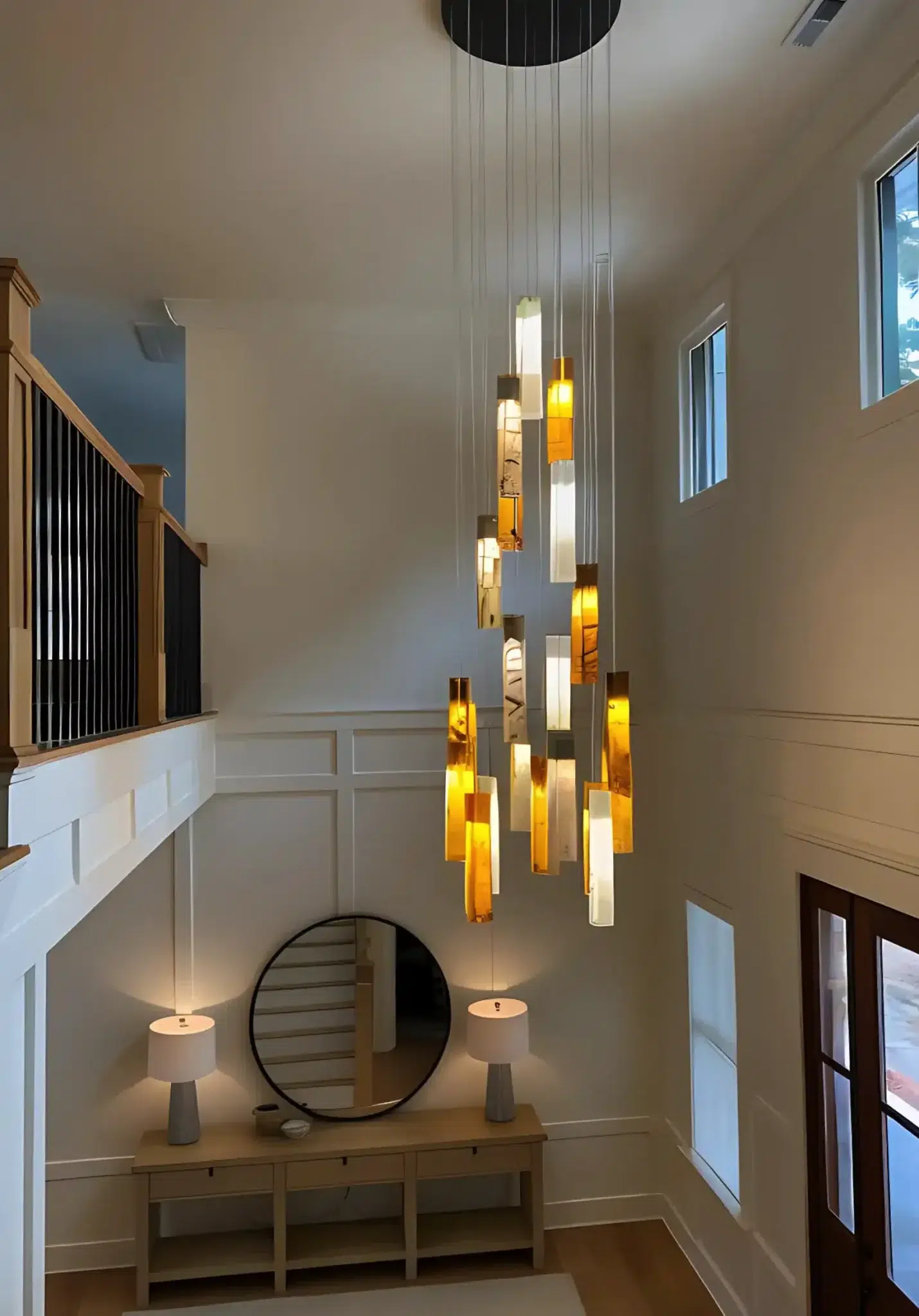 Handmade SunBeam Murano glass pendant chandelier above kitchen island featuring white and frosted glass