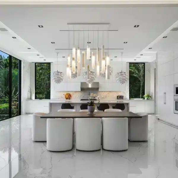 White modern kitchen with white light fixture