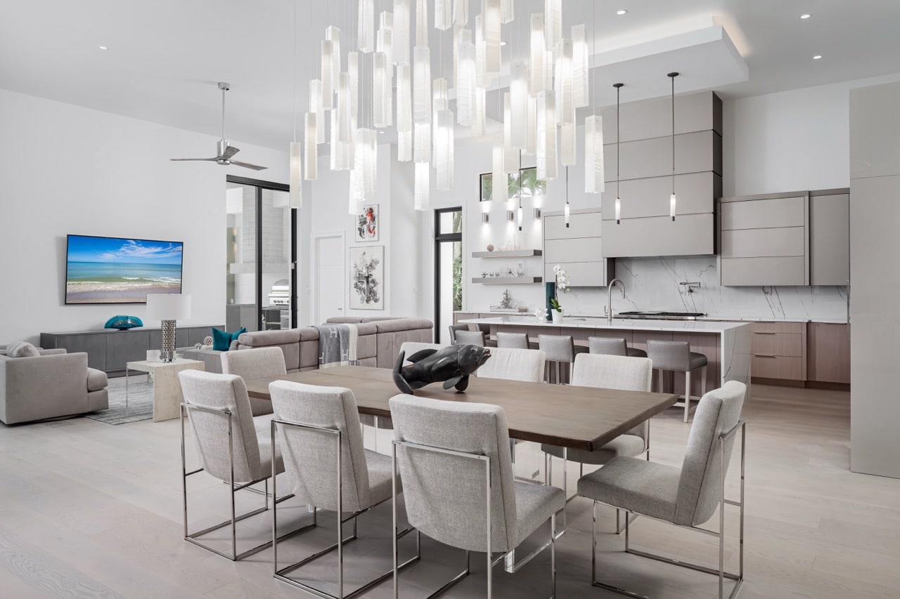 Custom art glass chandelier installation large modern dining space