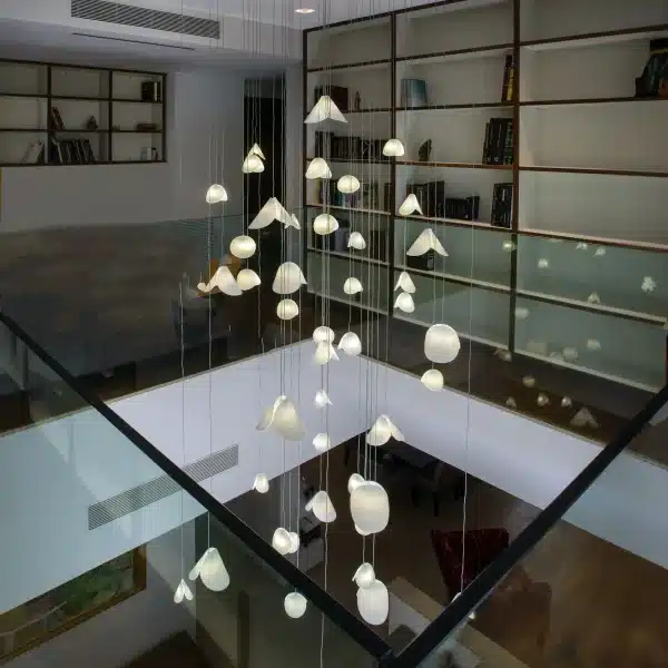 Bivalvia chandelier installation for double-height space