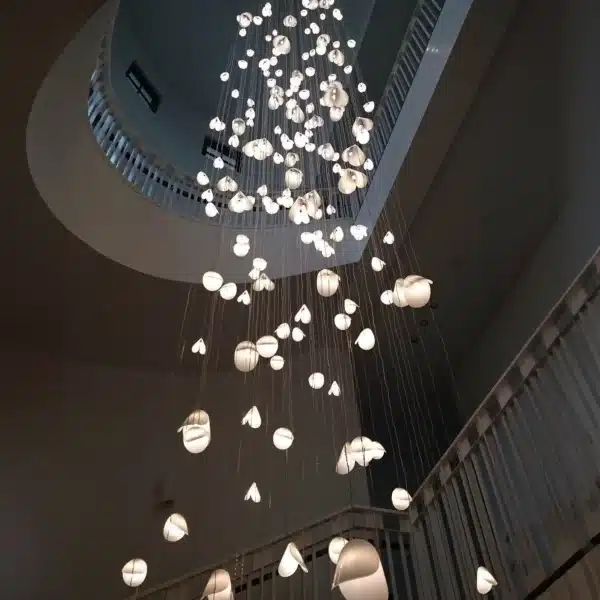 Multi-pendant Bivalvia glass chandelier for high-ceiling foyer